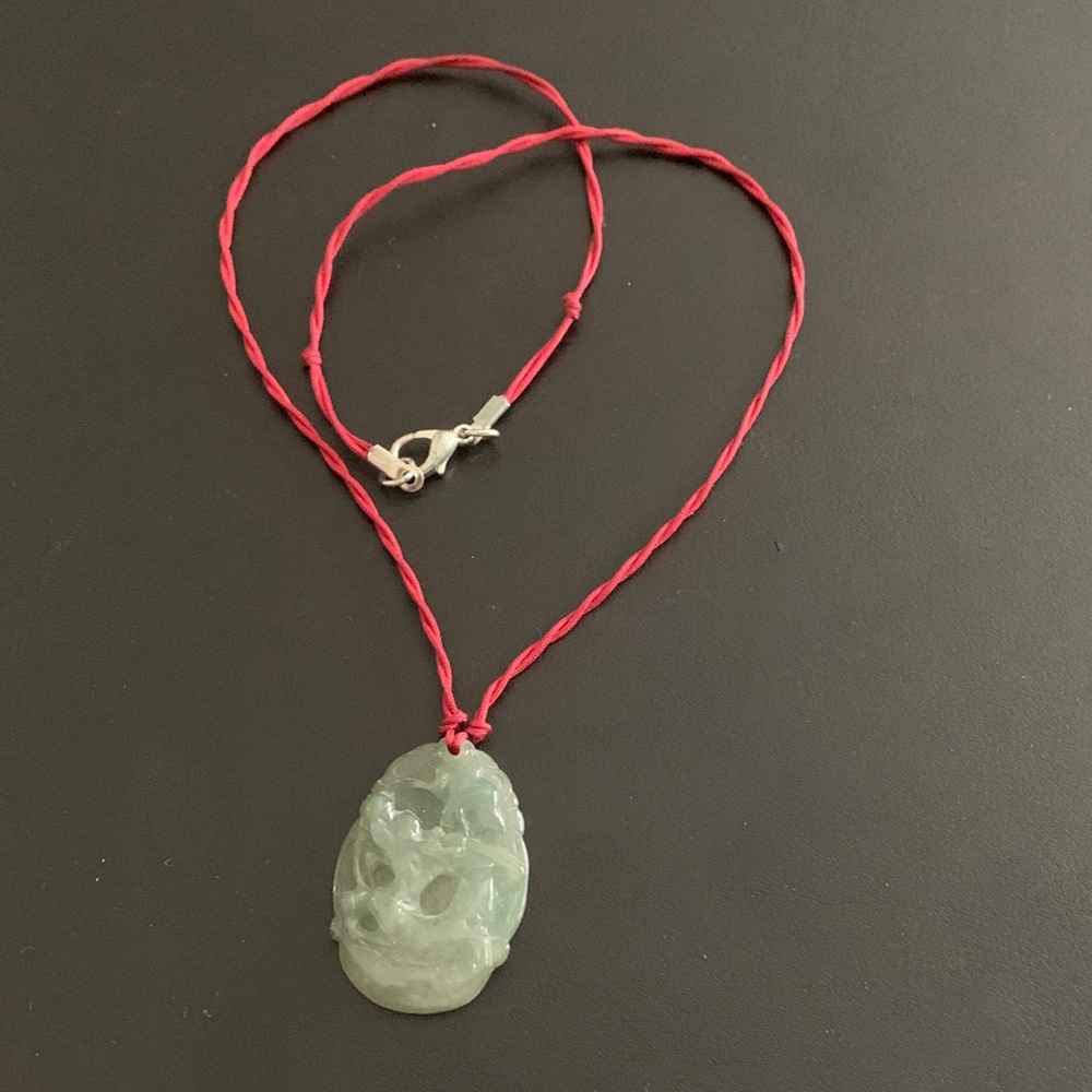 Elegant Jade Pendant Necklace with Red Cord